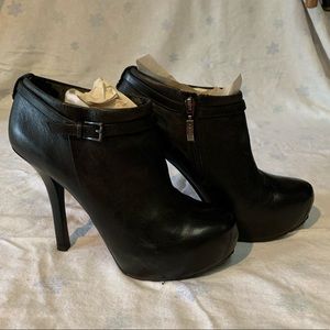 Women's black platform booties.